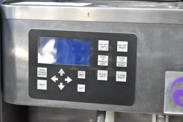 Stoelting F231 stainless steel soft serve machine control panel, showing digital display and function buttons.