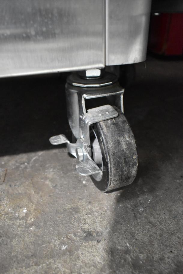 Stoelting F231-18I2YGAD1 Soft Serve Ice Cream Machine, stainless steel, commercial casters, 2 flavor with twist, 208-240V.