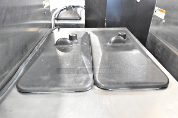 Stoelting F231-18I2YGAD1 stainless steel 2-flavor soft serve ice cream machine. Commercial casters, 208-240V, 1 phase.