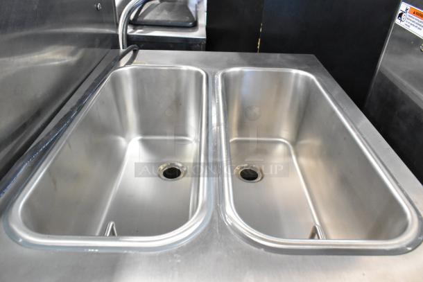 Stoelting F231-18I2YGAD1 stainless steel ice cream machine with dual flavor bins, commercial casters, excellent condition.