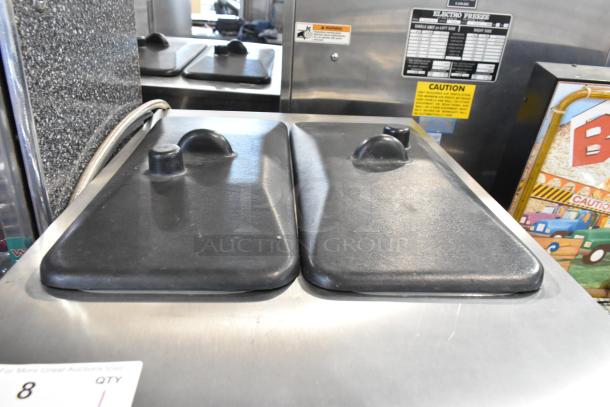 Stoelting F231-18I2YGAD1 stainless steel soft serve machine, dual flavor with twist, commercial casters, 208-240V, 1 phase.