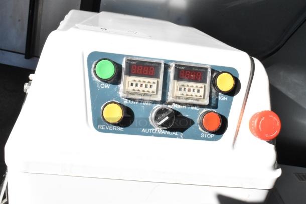 Estella 348SM80 spiral dough mixer control panel showing speed and timer settings, includes buttons for low, high, reverse, and stop.