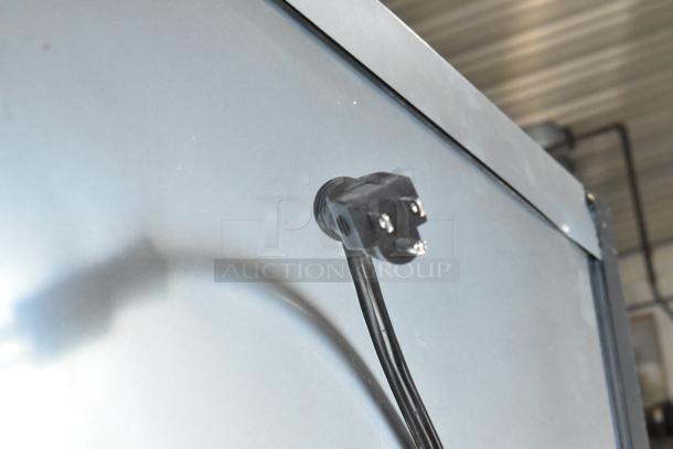 Black power cord and plug of Avantco 189BVAC46HC refrigerated air curtain merchandiser, showing exterior finish.
