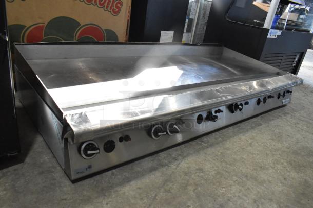 Brand new Garland 372GT72GT72N stainless steel natural gas griddle, 168,000 BTU, thermostatic controls, slight surface dents.