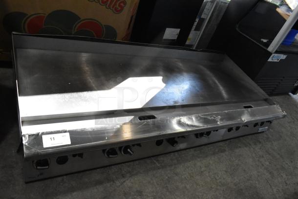 Brand new Garland 372GT72GT72N stainless steel commercial griddle, thermostatic controls, 168,000 BTU, minor scratches.