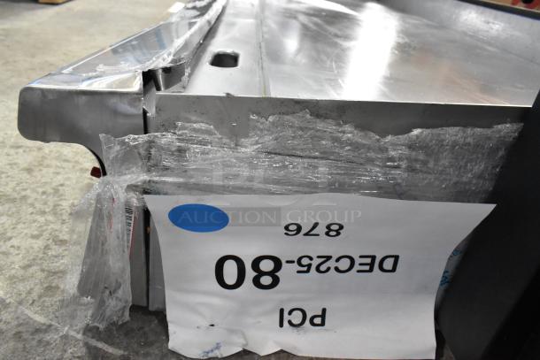 Brand new Garland 372GT72GT72N stainless steel commercial griddle, natural gas, 168,000 BTU, scratch and dent condition.