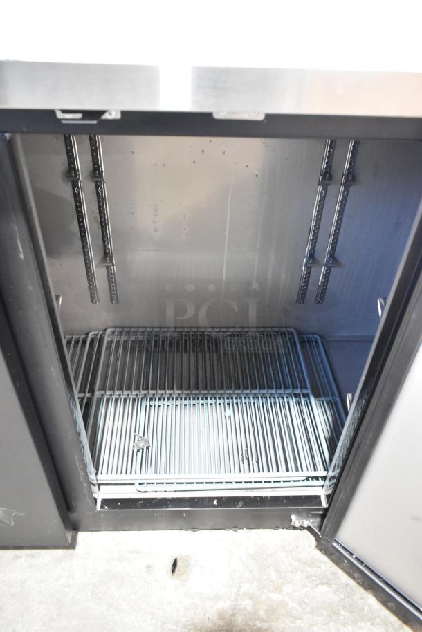 BRAND NEW Avantco 178UBB72HC, 73" black metal back bar refrigerator, LED lighting, 115V, scratch and dent condition.