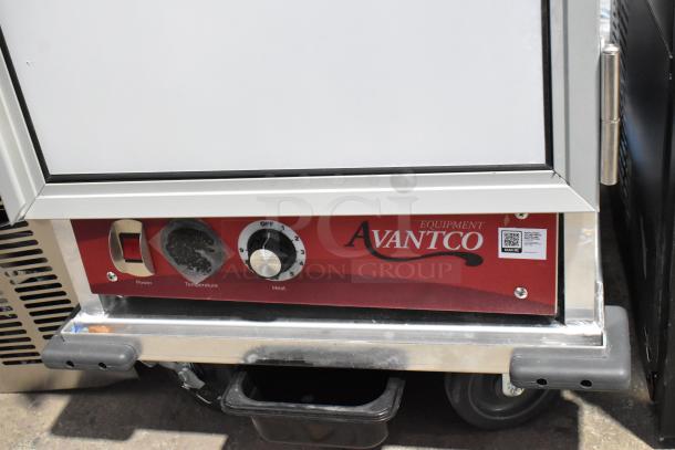 Brand new Avantco 177HEAT1836I commercial heated holding cabinet with clear door, minor scratches, on casters, 120V, 1 Phase.