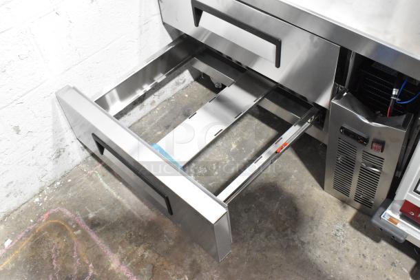 Avantco 178CBE36HC stainless steel chef base with 2 drawers, new scratch and dent condition, on commercial casters.