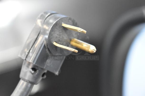 Close-up of a 115-volt power plug for Beverage Air BZ13-1-B commercial cooler, showcasing intact prongs.