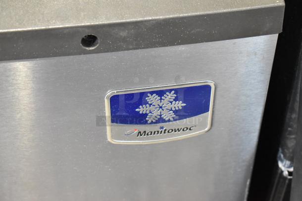 Manitowoc IY0606W-261D stainless steel ice head, 208-230V, 1 phase, with logo, commercial use, durable condition.