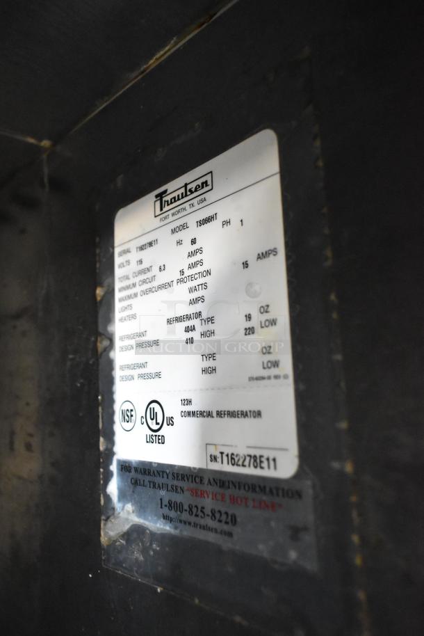 Traulsen TS066HT stainless steel commercial prep table label, model details, 115V, 1-phase, UL listed, on casters.