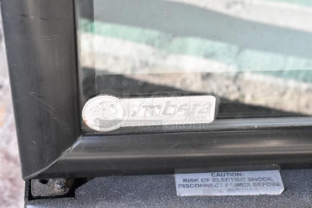 Imbera G319 cooler label with logo, black frame, and caution sticker. 115V, 1-phase model, used for commercial merchandising.