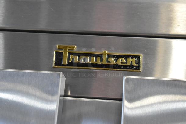 Traulsen G20010 stainless steel commercial cooler, 2-door, poly-coated racks, 115V, 1 phase, Traulsen logo on front.