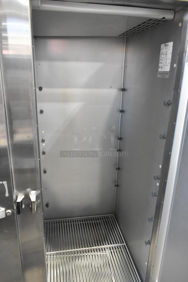 Traulsen G20010 stainless steel 2-door cooler with poly coated racks, 115V, 1-phase, pristine interior, visible model label.
