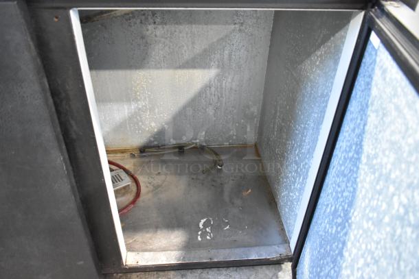 Beverage Air DD58 kegerator interior showing wear. Includes beer tower and couplers. 115 volts, 1 phase, metal construction.