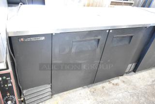 True TDD-2 metal commercial kegerator with beer tower, visible branding. 115 volts, 1 phase, good condition.
