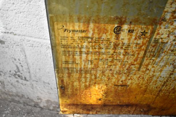 Frymaster FPGL230-2RCA fryer label showing model, BTU rating, certifications, and usage instructions, worn condition.