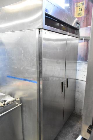 Delfield stainless steel commercial 2-door reach-in cooler, left door locked, 115 volts, 1 phase, used condition.