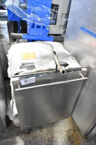 General Electric GE ZBD6880N00SS Monogram stainless steel undercounter dishwasher, 115V, 1 phase, like-new, with visible tags.