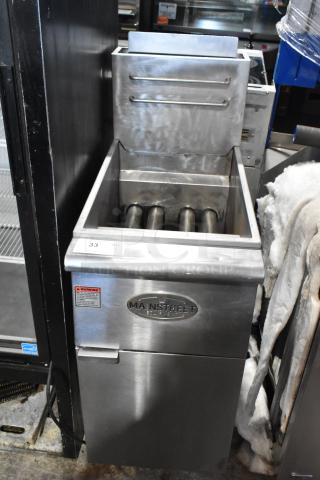 Mainstreet stainless steel deep fat fryer, commercial-grade, floor style, visible logo, and warning label; used condition.