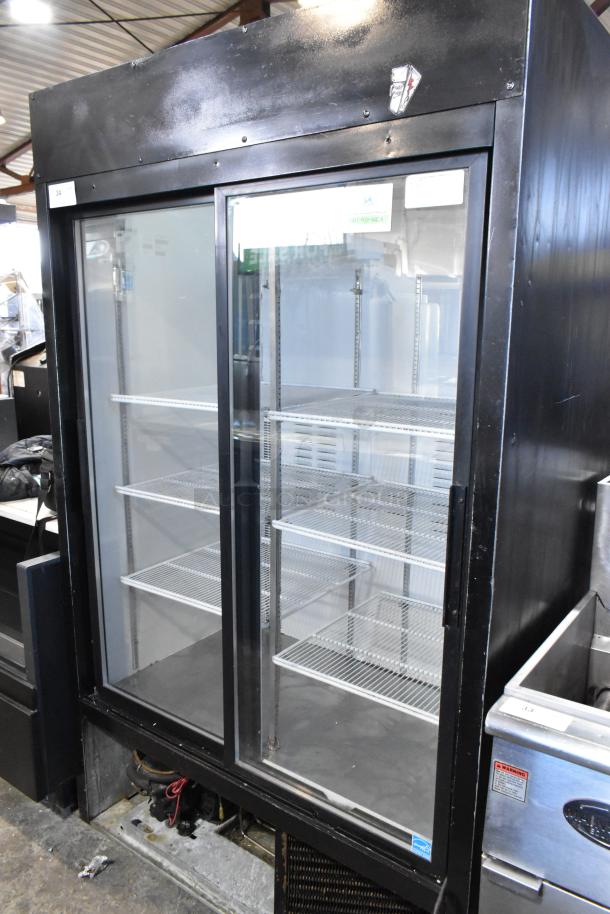 Habco ESM42 commercial 2-door reach-in cooler, metal casing, poly coated racks, 115V, 1 phase, good condition.