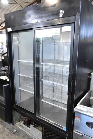 Habco ESM42 commercial 2-door reach-in cooler, metal casing, poly coated racks, 115V, 1 phase, good condition.