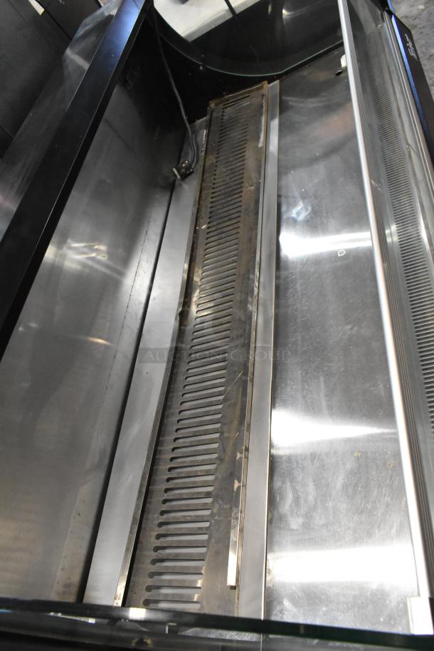 Turbo Air TOM-60SB metal commercial open air merchandiser, 115V, 1 phase, shows interior shelves and chrome finish.