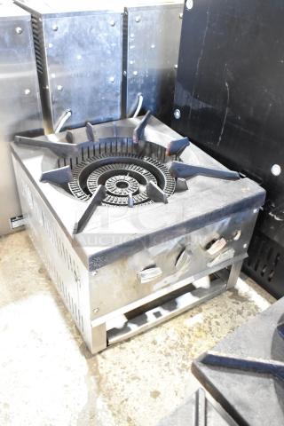 Stainless steel commercial countertop gas burner, single pot range; features sturdy cast iron grate, dual control knobs.