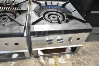 Stainless steel commercial countertop gas-powered single burner stock pot range, sturdy design, used condition.