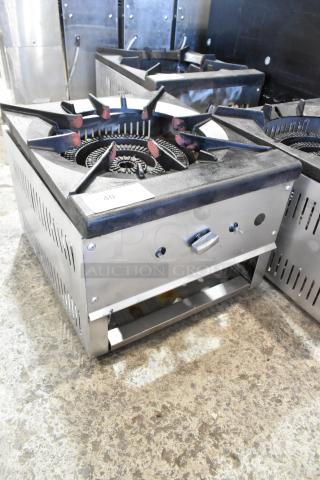 Stainless steel gas-powered countertop single burner stock pot range, featuring durable construction and control knob. In good condition.
