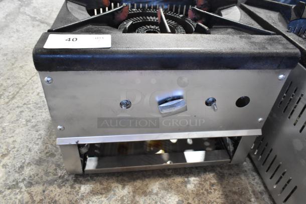Stainless steel commercial countertop gas-powered single burner stock pot range, durable with control knob and vent. Item tag: "40".