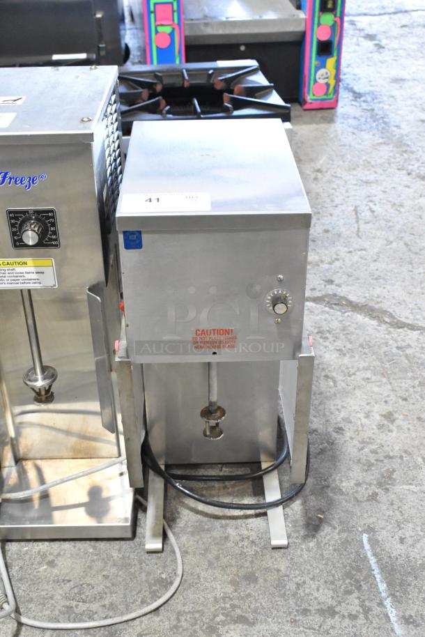 Flavor Fantasia MR-7 stainless steel commercial countertop drink mixer, 115V, 1 phase, labeled "Caution" near mixing blade.