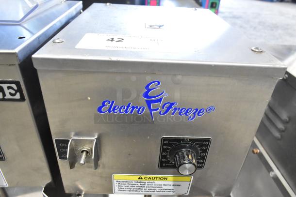 Electro Freeze HDM-75A-1 stainless steel drink mixer, 115V, 1 phase, with temperature dial and caution label on front panel.