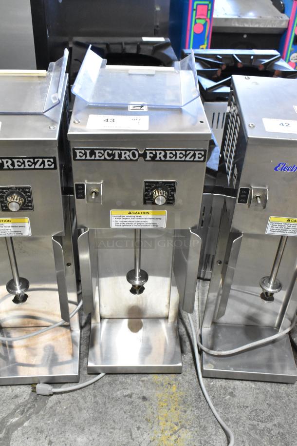 Electro Freeze HDM75A stainless steel countertop drink mixer, 115V, 1 phase, with control dial and caution labels, in used condition.