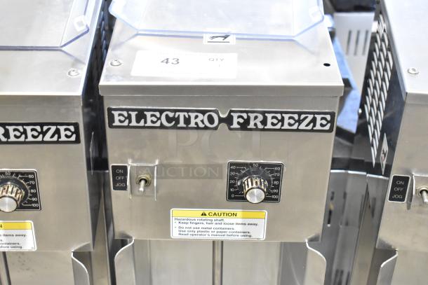 Electro Freeze HDM75A stainless steel countertop drink mixer, 115V, 1 phase, with control knobs and caution labels visible.