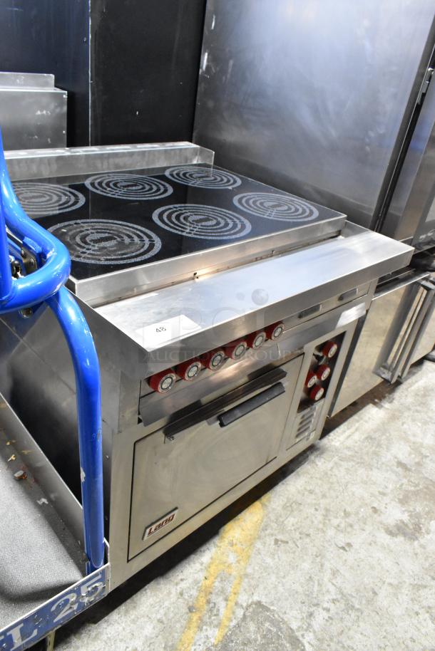 Lang RTI36E stainless steel commercial electric 6 burner range with oven, 208-240V, 3-phase. Features control knobs.