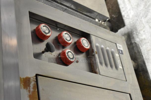 Lang RTI36E stainless steel 6-burner electric range with oven. Features include red control knobs. 208-240V, 3-phase.