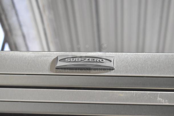 Sub Zero stainless steel commercial 2-door unit with 4 drawers. 115 volts, 1 phase. Appears in good condition.