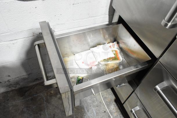 Sub Zero stainless steel commercial 2-door unit with 4 drawers. Shows interior drawer content. 115V, 1 phase.