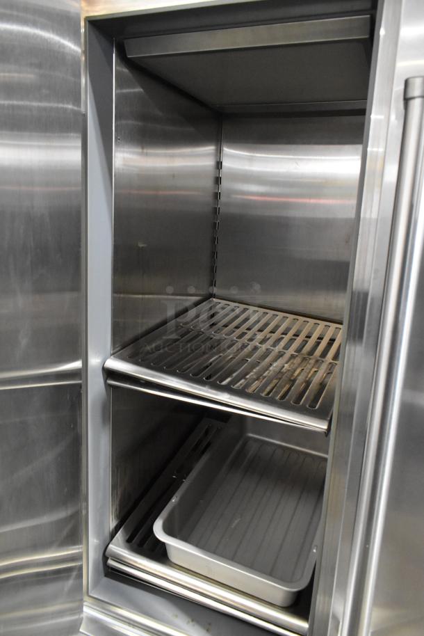 Sub Zero stainless steel commercial 2-door unit with 4 drawers, 115 volts, 1 phase; features shelving and robust construction.