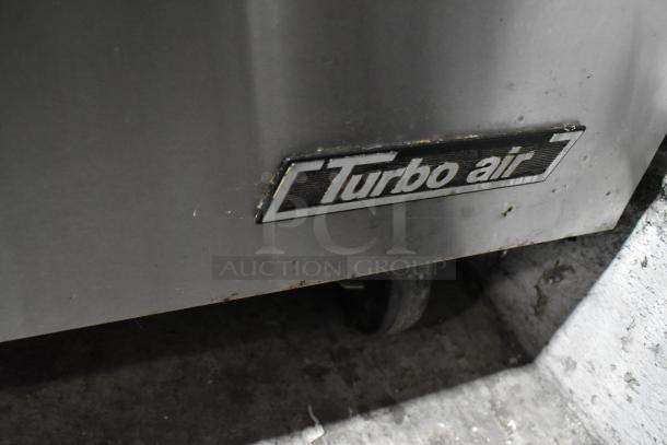 Turbo Air TUR-48SD stainless steel 2-door undercounter cooler, commercial casters, visible logo, 115V, 1 phase.
