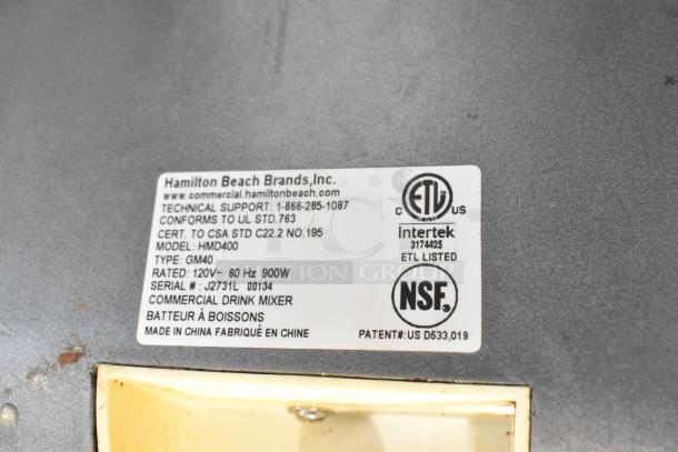 Hamilton Beach HMD400 commercial drink mixer label showing model, technical specs, ETL and NSF certifications.