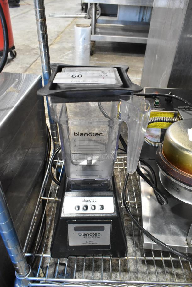 Blendtec ES3 Countertop Blender, 120 Volts, 1 Phase, clear pitcher with measurement markings, black base, good condition.