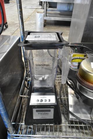 Blendtec ES3 Countertop Blender, 120 Volts, 1 Phase, clear pitcher with measurement markings, black base, good condition.