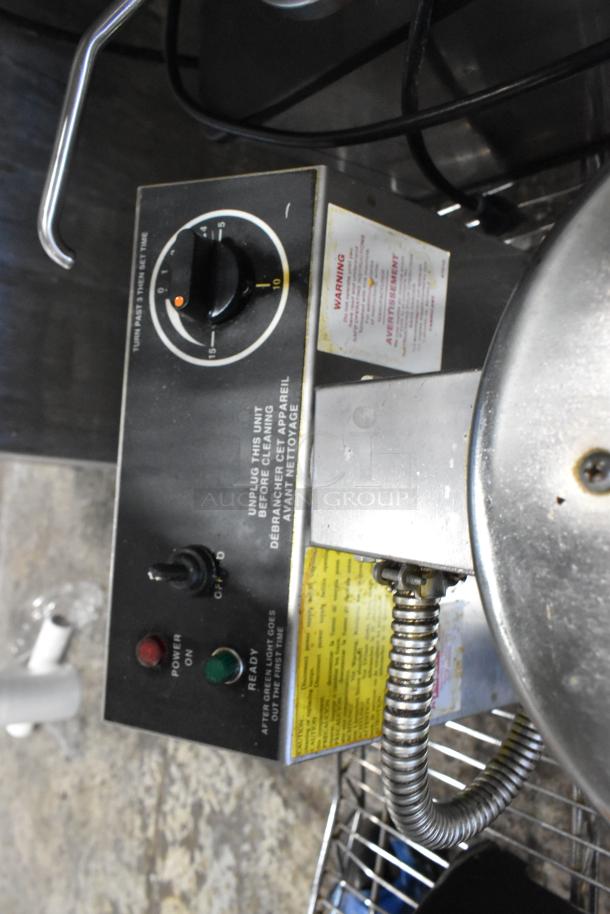 5020 Stainless Steel Commercial Waffle Cone Maker, 120 Volts, 1 Phase. Features control panel with timer, power switch, and warning label.