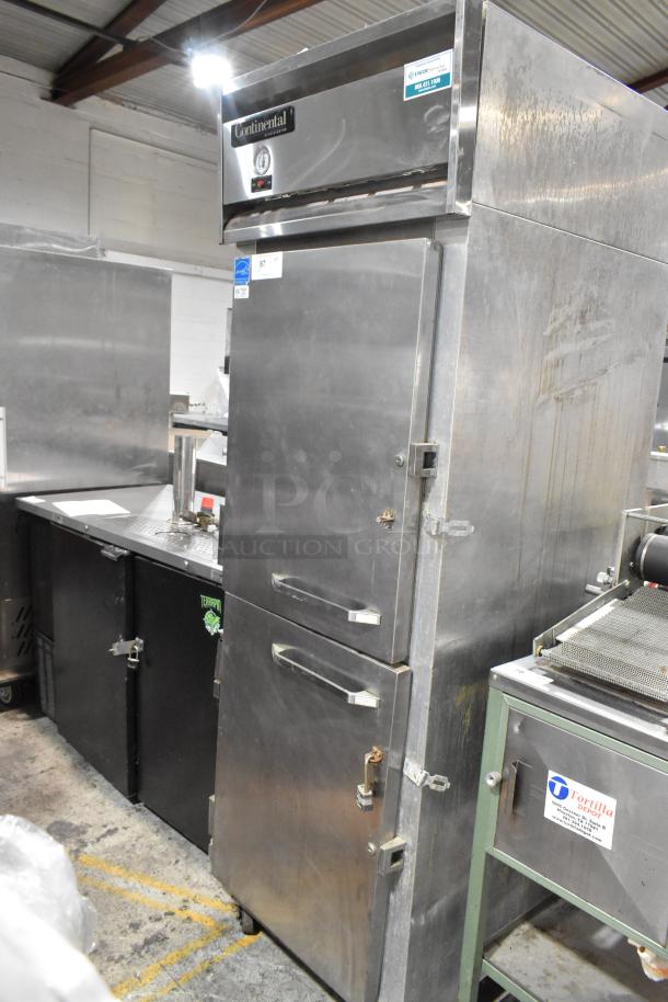 Continental 1R-HD Stainless Steel Commercial Cooler, 2 Half Size Doors, on Casters. 115V, 1 Phase, Used Condition.