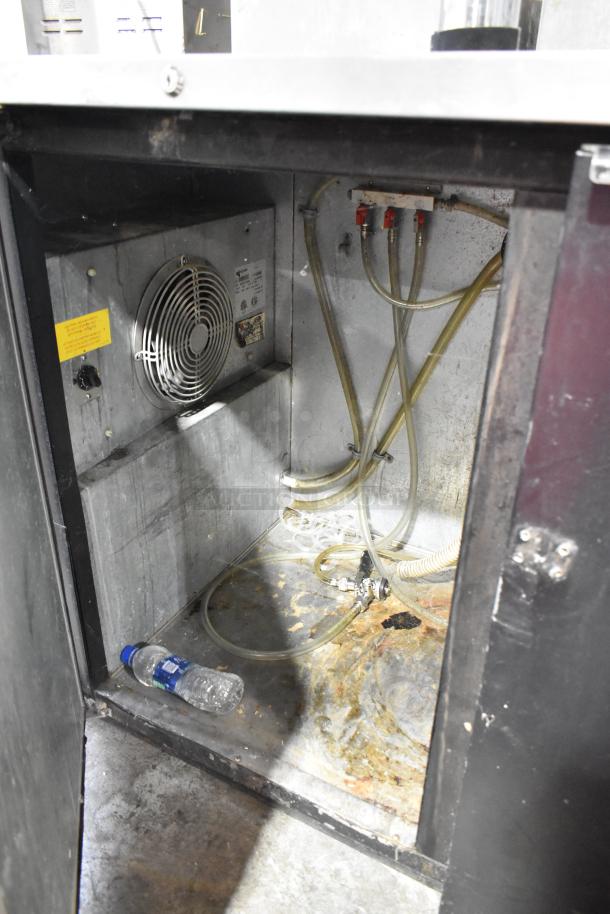 Micro Matic MDD-58 commercial kegerator interior showing wiring and fan; used condition with visible wear.