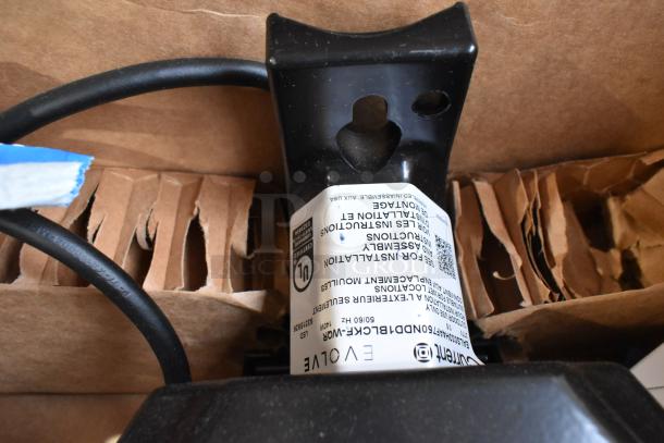 9 Current Evolve LED Series Area Light in packaging, featuring model and installation labeling. New condition.