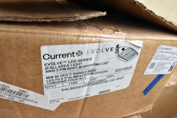 Current Evolve LED Series Area Light box showing product label and specifications, including 116W, 240V.